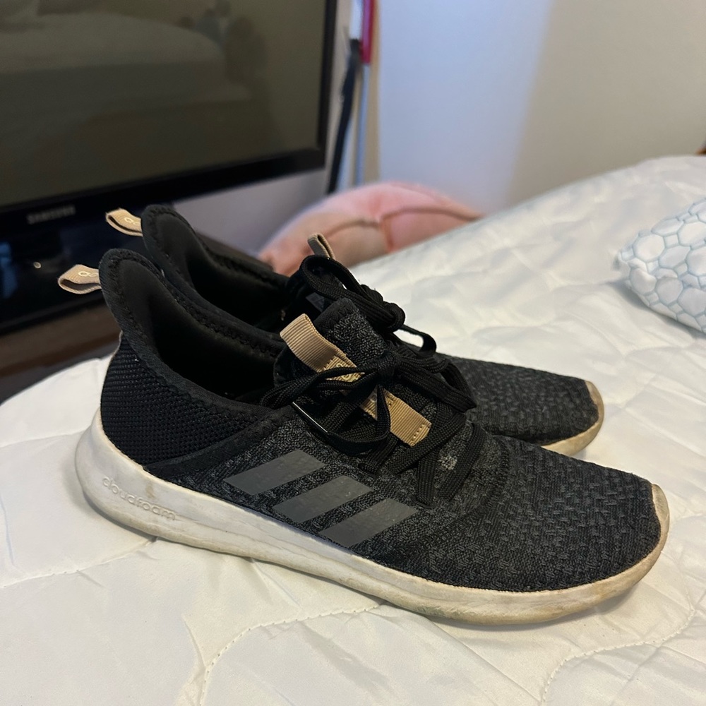 Adidas Cloudfoam. Size 8. Black and gold. Worn but still in good condition.